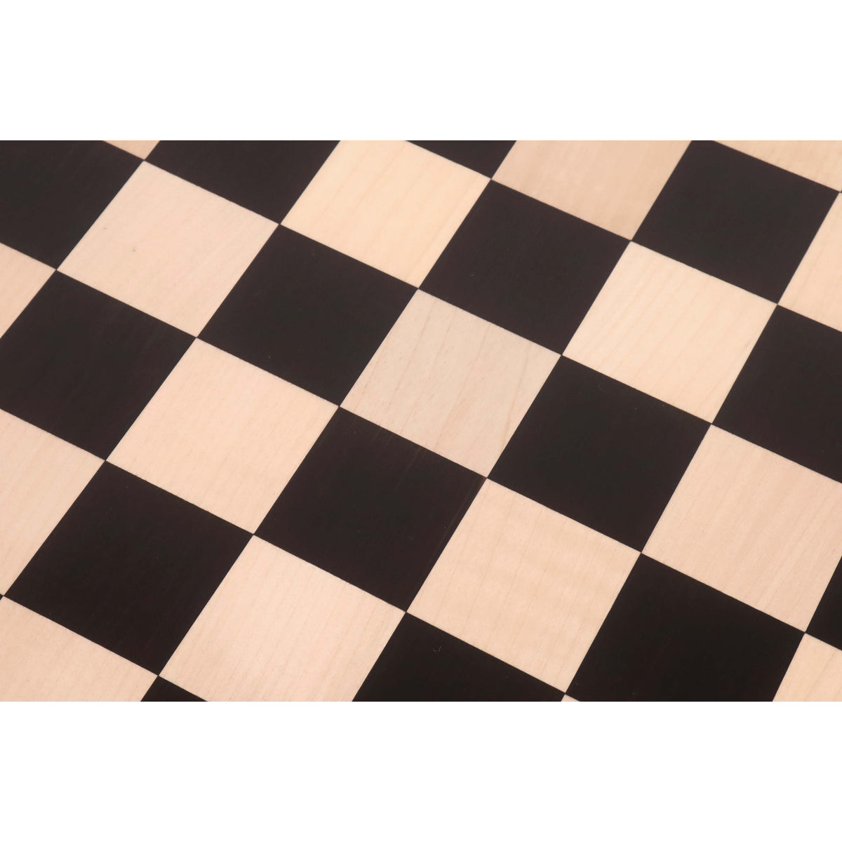 Close-up of the natural wood grain on the Ebony (dark) and Maple (light) squares of a 21 inch luxury board.