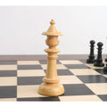 Elegant boxwood queen piece from the Edinburgh upright pre-Staunton chess set on a chessboard.