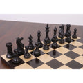 Diagonal arrangement of the black Sleek Staunton ebony chess pieces on a board.