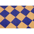 Top-down macro shot focusing on the contrast between the printed burl boxwood and blue ash burl 57mm squares.