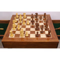 Action shot of a chess game in progress on the 23" Golden Rosewood tournament chess table with weighted Staunton pieces.