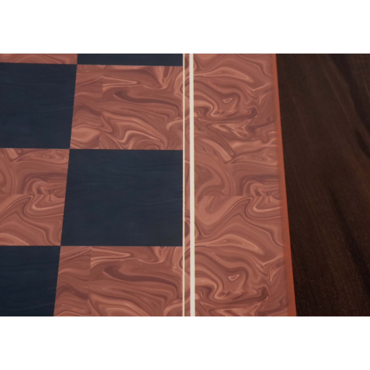 Close-up of the delicate white pinstripe border inlay separating the playing field from the burl wood printed frame.