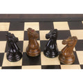Four Giant 1849 Staunton Knights (two Ebony, two Distressed Boxwood) in a square formation.