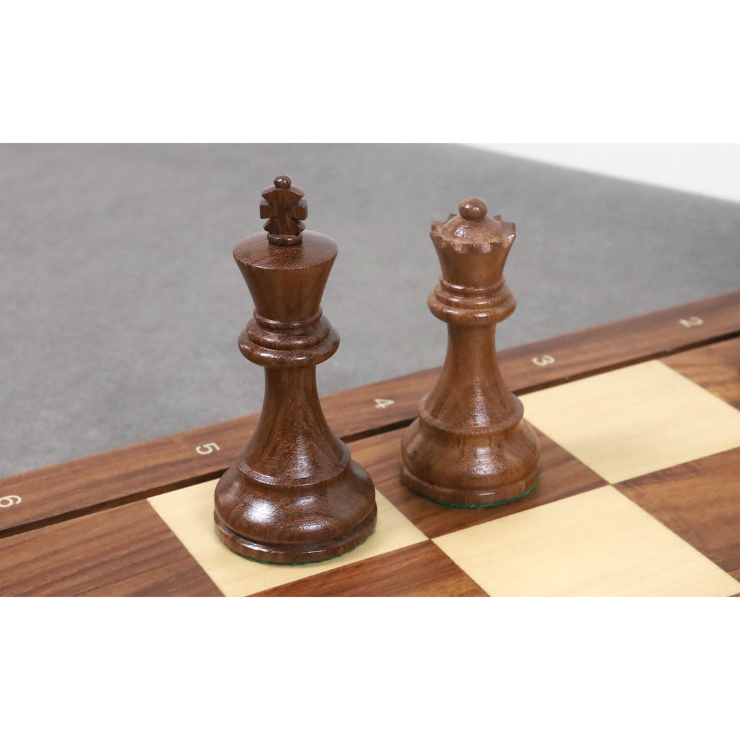 Close-up of the Golden Rosewood King and Queen from the 1972 Championship series showing natural wood grain.