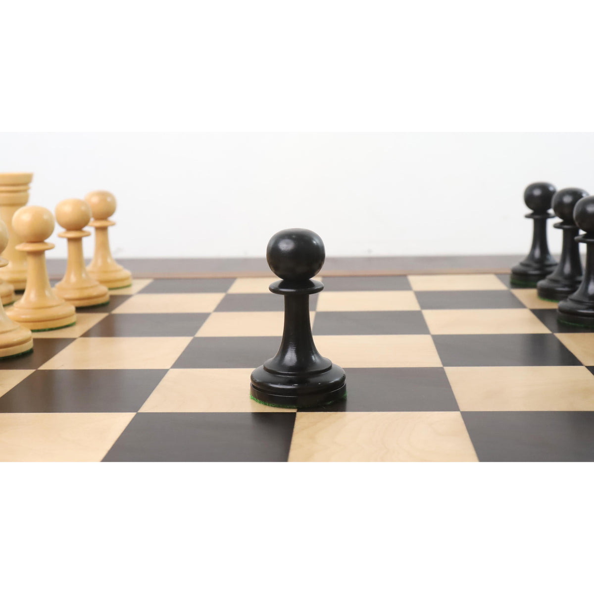 Hand-carved ebonised boxwood pawn from the Averbakh Soviet chess collection.