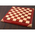 Perspective view of a 21 inch bud rosewood and maple luxury chessboard with 55 mm squares.