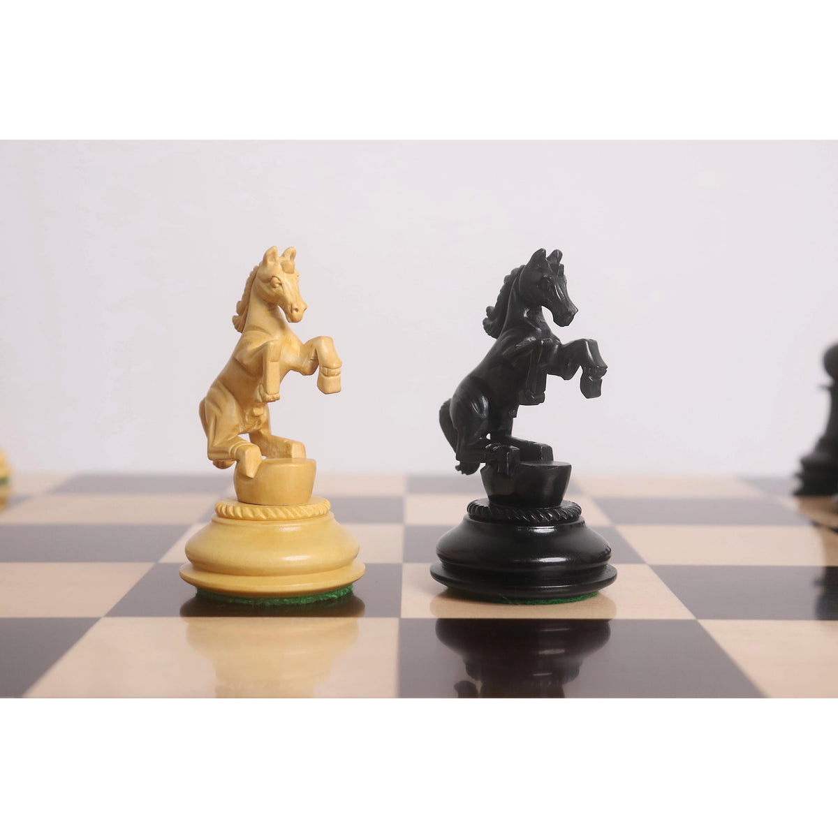 Rearing boxwood and ebony wood Knights from the 4.5 inch Incitatus luxury Staunton chess set.