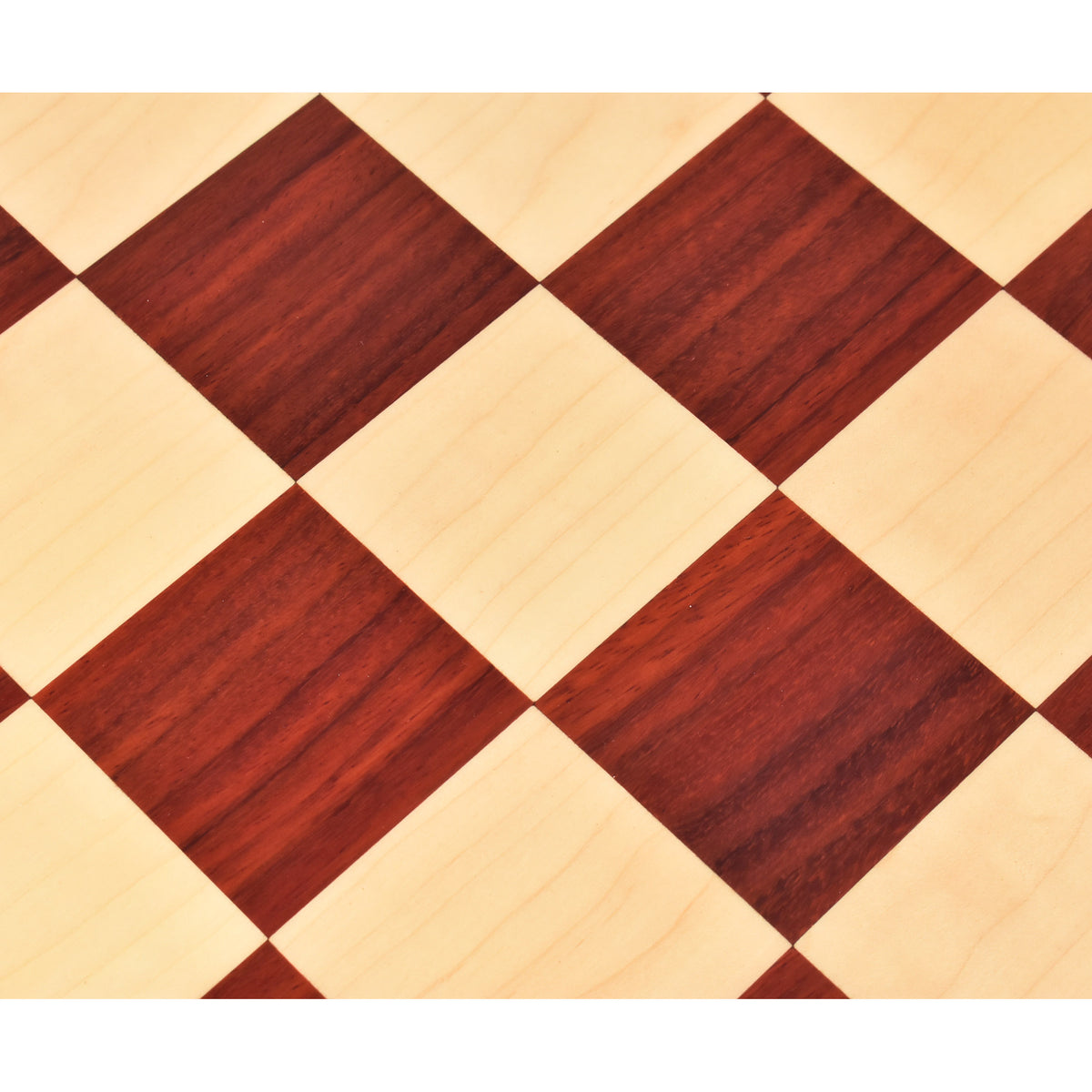Extreme close-up of the 60mm chessboard squares highlighting the contrasting textures of Bud Rosewood and Maple.