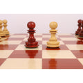 Red budrose and light boxwood pawns from the 4.5-inch Carvers' Art luxury chess set.