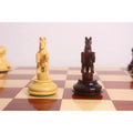 Front-facing view of the expertly sculpted luxury Staunton rearing Knights on a polished chess board surface.