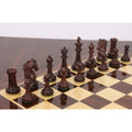 Starting formation of the dark Rosewood chess pieces from the 3.9" Heritage Series Staunton set arranged on a wooden chessboard.