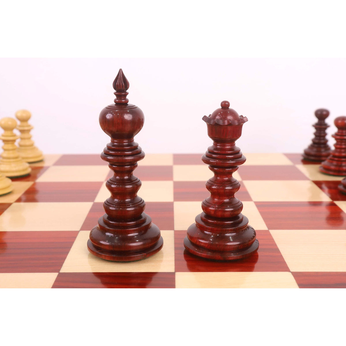Hand-carved bud rosewood Staunton king and queen set.