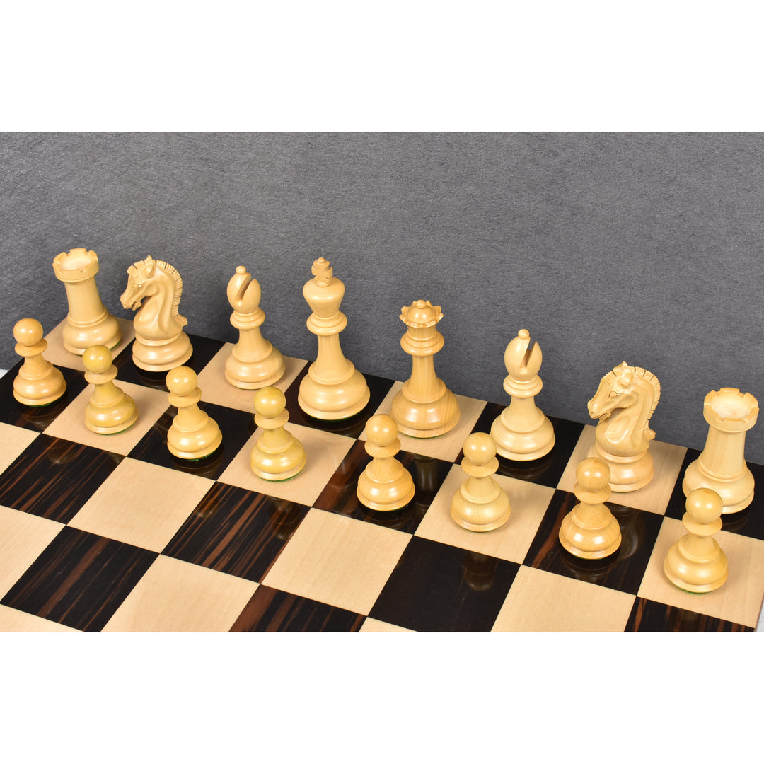 Natural boxwood chess pieces arranged on the board in starting formation.