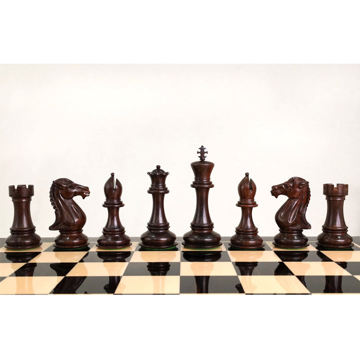 Front view of dark rosewood major chess pieces aligned on the board.