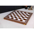 Unfolded 21-inch golden rosewood and acrylic ivory inlaid chess board.