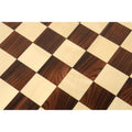 Detailed texture of the alternating Rosewood and Maple wood squares on a 55mm square chess board.