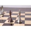 Detailed comparison of copper and silver Pawn chess pieces.