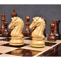 Two light knights standing side-by-side on the chessboard with other pieces in the background.