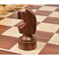 Close-up of a carved dark golden rosewood knight from the Bundesform German Staunton set.