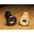 Detailed view of the hollowed base of Craftsman Staunton chess pieces, designed for Chessnut Air sensors.