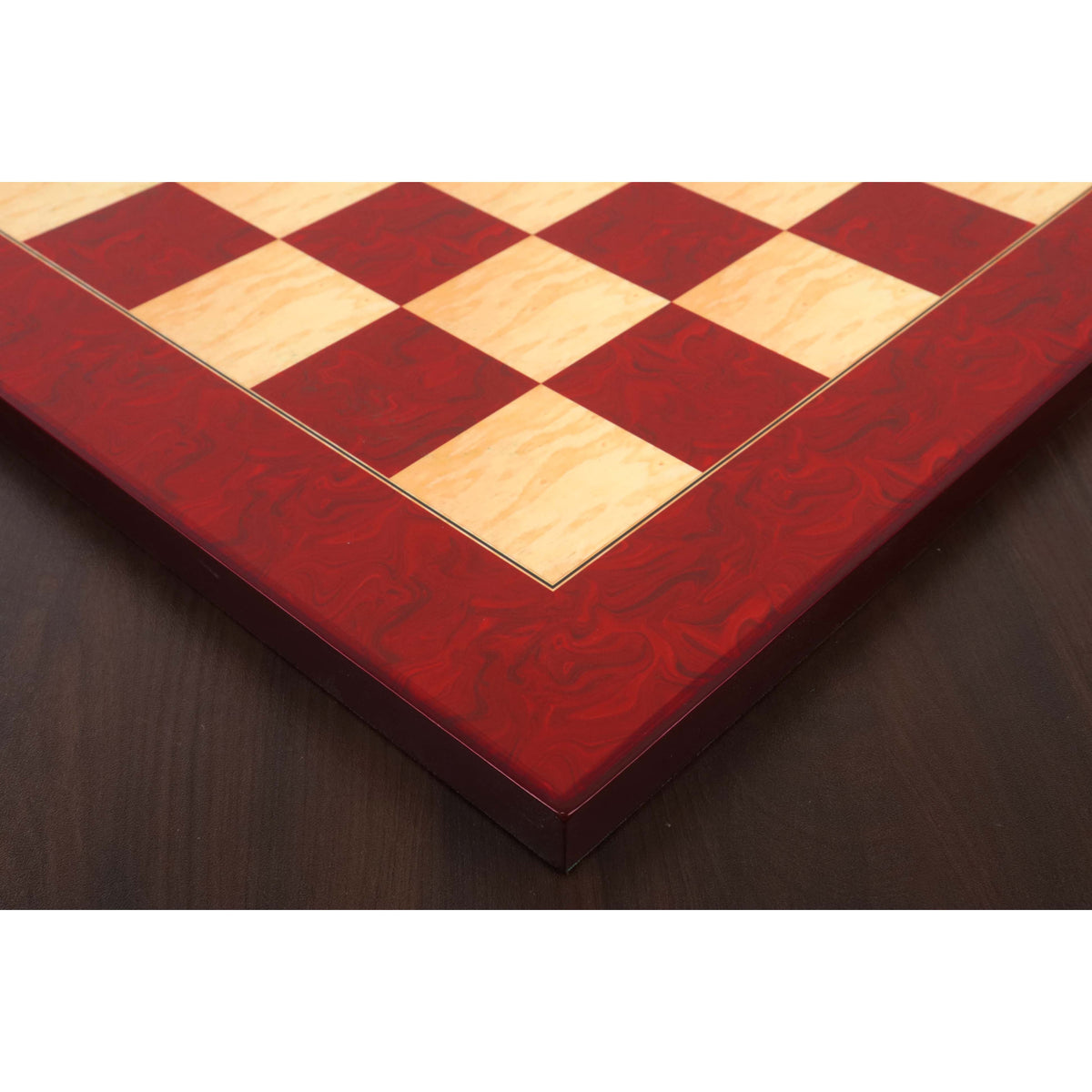 Detailed shot of the decorative border and corner craftsmanship of the Red Ash Burl & Boxwood printed chess board.