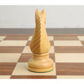 Rear view of a hand-carved wooden chess knight showing detailed mane