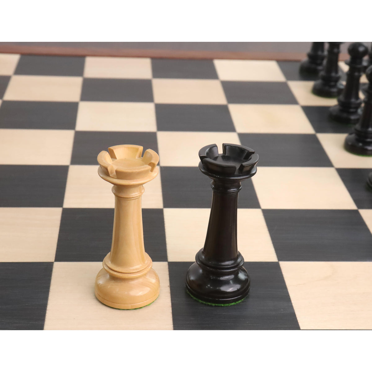 Boxwood and ebony rooks from the Edinburgh northern upright pre-Staunton chess pieces set.
