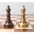 Side-by-side antiqued copper and matte gold bishops from the Pro Staunton brass metal luxury chess set.