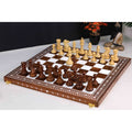 Pro Staunton rosewood chess set displayed on an inlaid folding board.