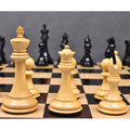 Boxwood king, queen, and bishop from the Sleek Staunton chess set in sharp focus.