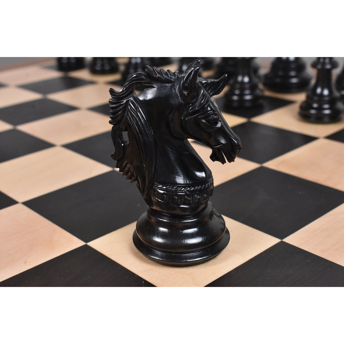 Hand-carved natural ebony knight piece from the Prestige Luxury Staunton chess set.