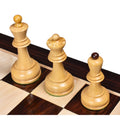 Close-up view of boxwood Dubrovnik king, queen, and bishop pieces.