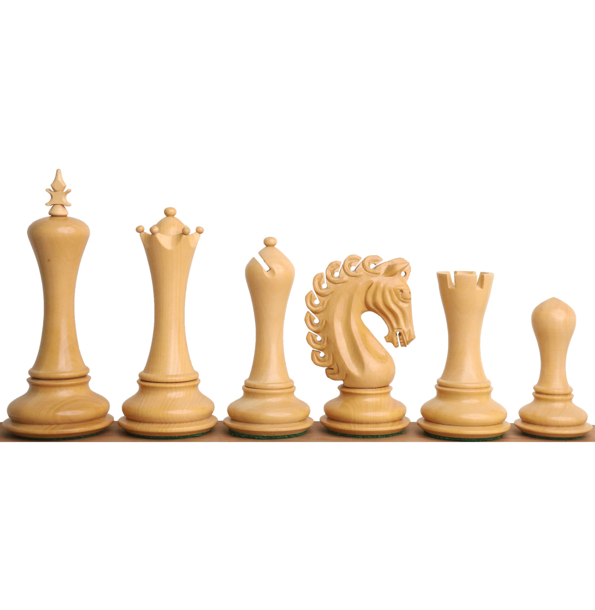 A complete collection of ivory boxwood Avant Garde chess pieces.