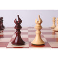 Detailed view of dark Bud Rosewood and light Boxwood Staunton bishops.