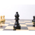Close-up of a black bishop from the 3.3" Tournament Staunton ebonised boxwood chess pieces set.