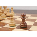 Simple and elegant Staunton pawns in boxwood and golden rosewood with weighted chamfered bases.
