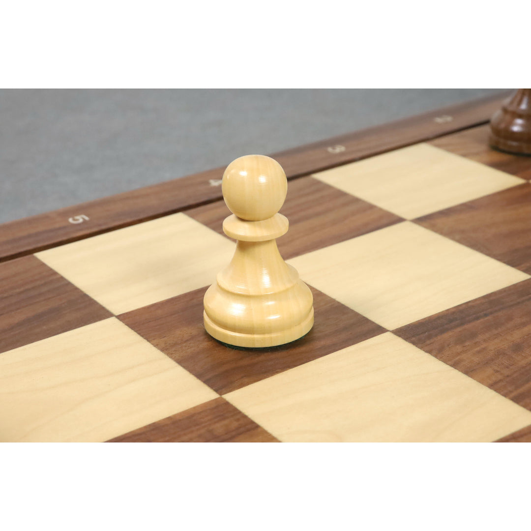 Profile view of a single Boxwood pawn on a wooden chessboard from the 1972 Fischer Spassky collection.