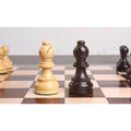 Premium boxwood and dark rosewood bishop chess pieces standing adjacent on a polished checkered wood board.