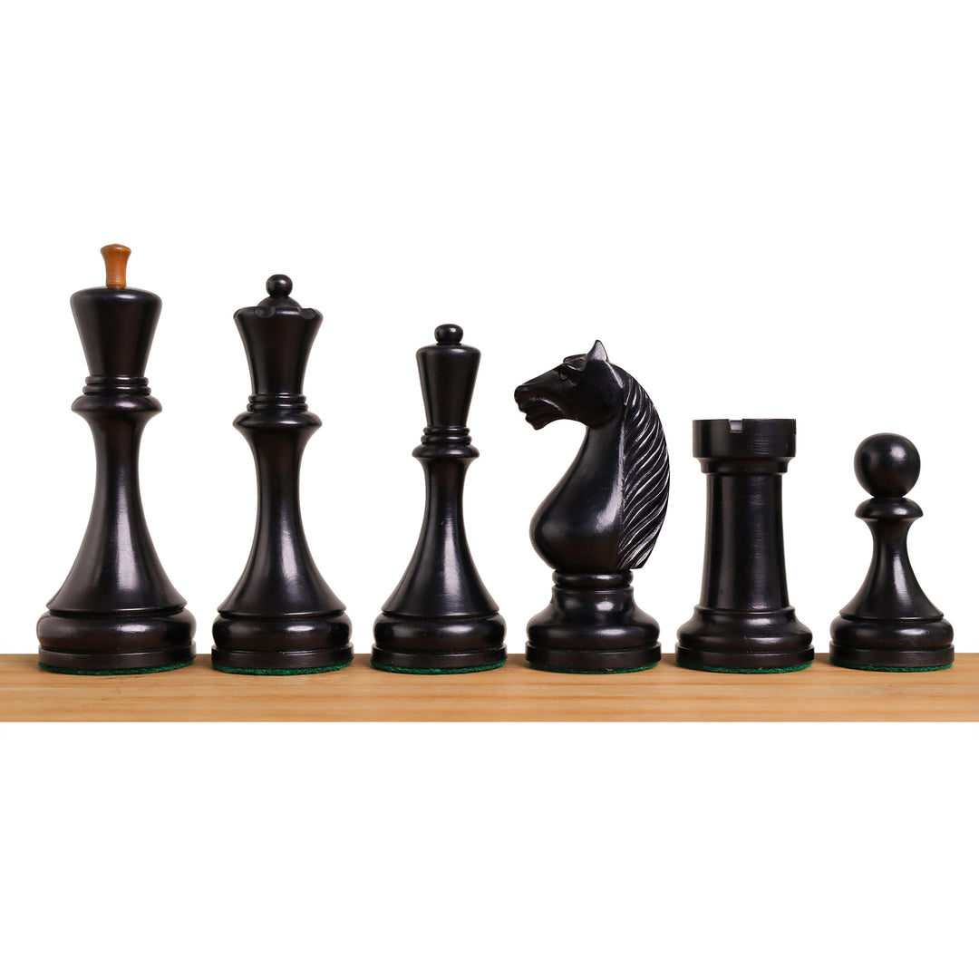 Complete black ebonized Botvinnik Flohr II Soviet chess pieces with weighted bases and green felt bottoms.