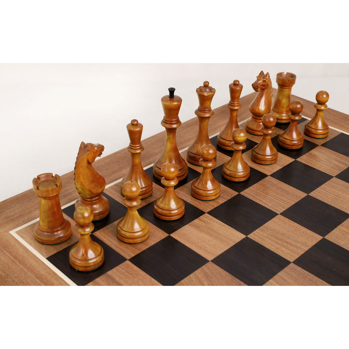 Light Botvinnik Flohr II chess pieces arranged on a handcrafted ebony and acacia wood chessboard.