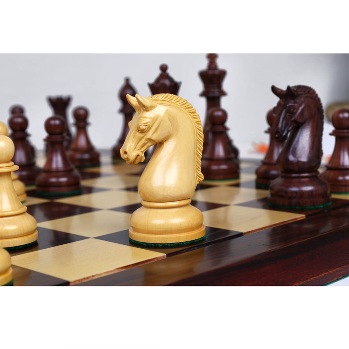 Close-up of the handcrafted boxwood knight displayed on a wooden chessboard