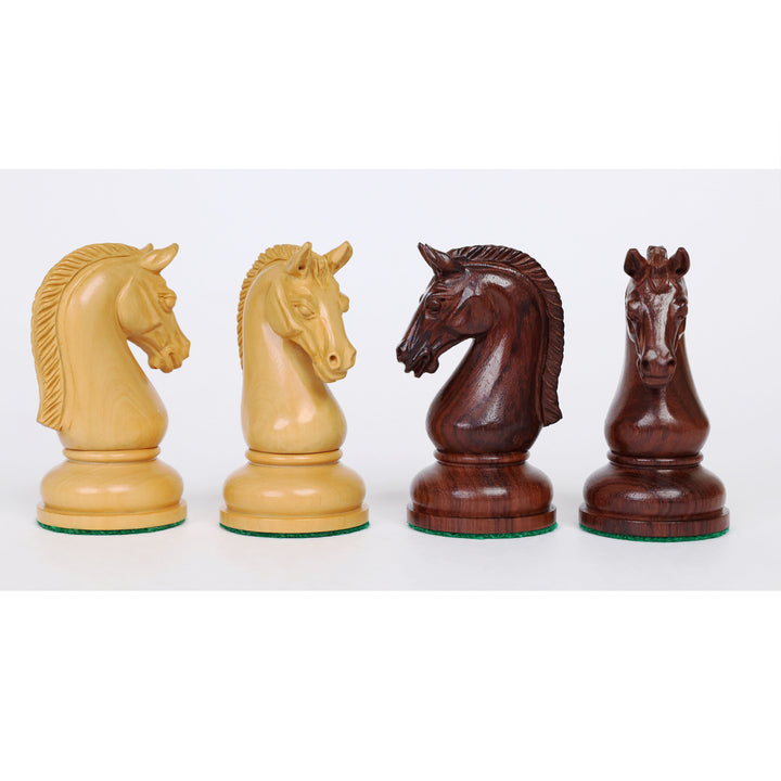 Close-up comparison of handcrafted boxwood and rosewood knight pieces from the Sovereign Crown chess set
