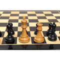 King and queen pieces from the 1972 Fischer Spassky set on the board.
