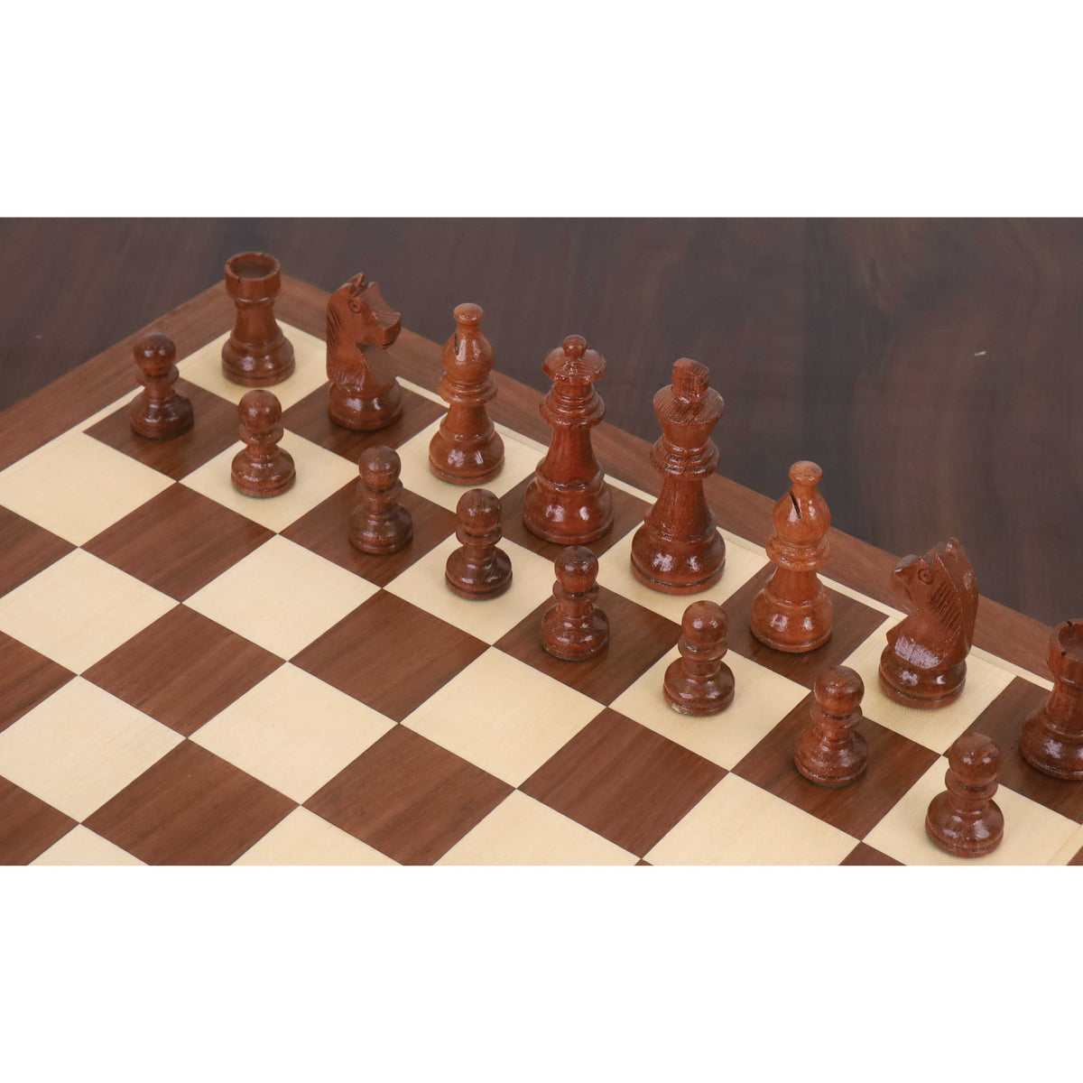 Handcrafted bud rosewood magnetic chess pieces arranged on a wooden chessboard.