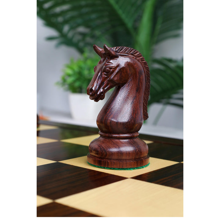 Close-up of the intricately carved rosewood knight from the Sovereign Crown luxury chess set