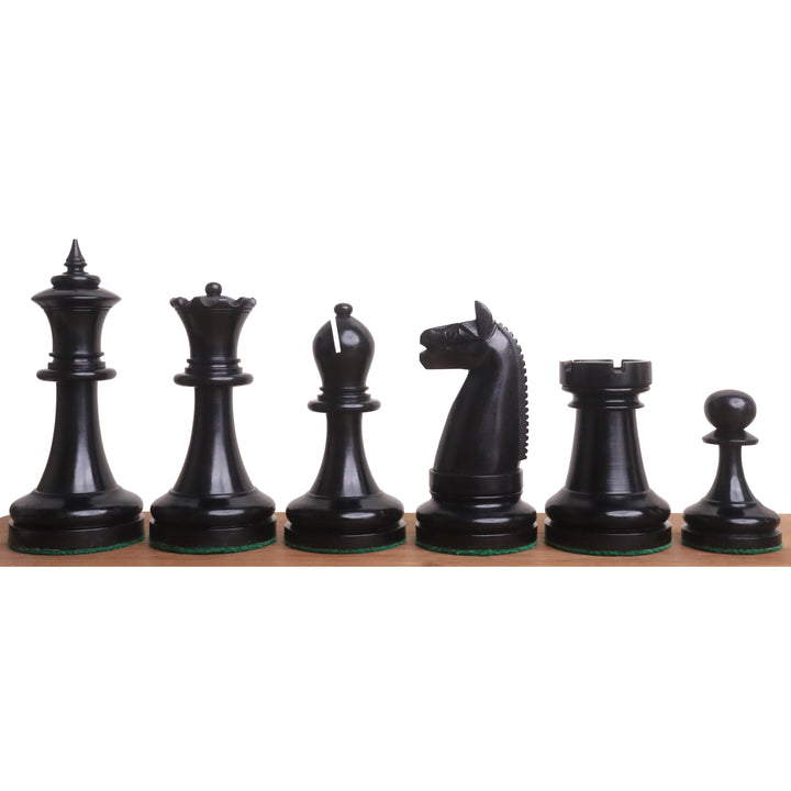 Polished ebony chess pieces from the 1900s American Chess Company reproduction series.