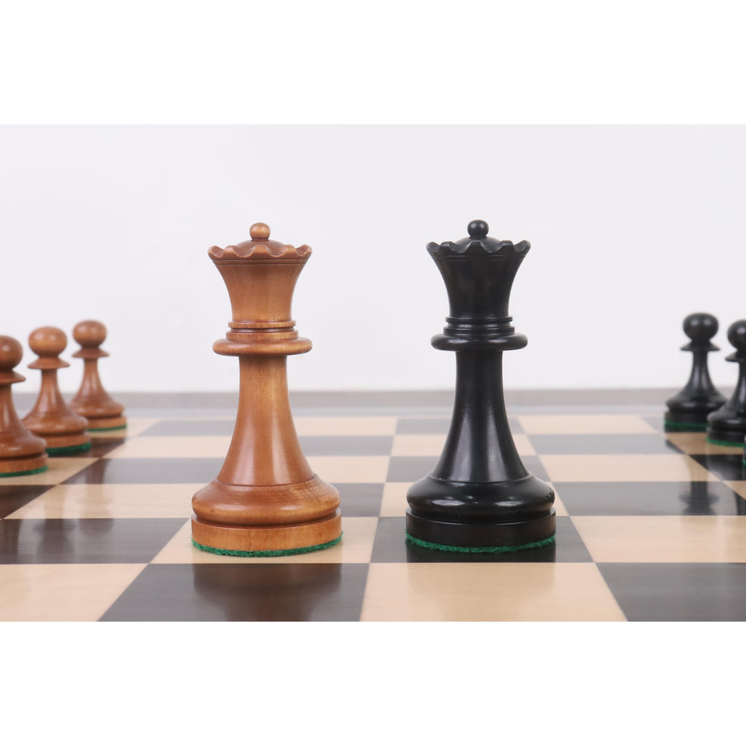 Antiqued and ebonized boxwood Queens from the American Chess Company reproduction set.