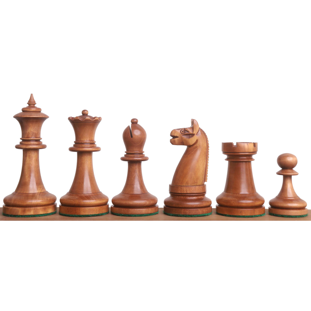 Set of antiqued boxwood chess pieces with fine Staunton details and felted bottoms.