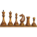 Full lineup of antiqued boxwood Soviet chess pieces from the 1935 Botvinnik Flohr-II set.