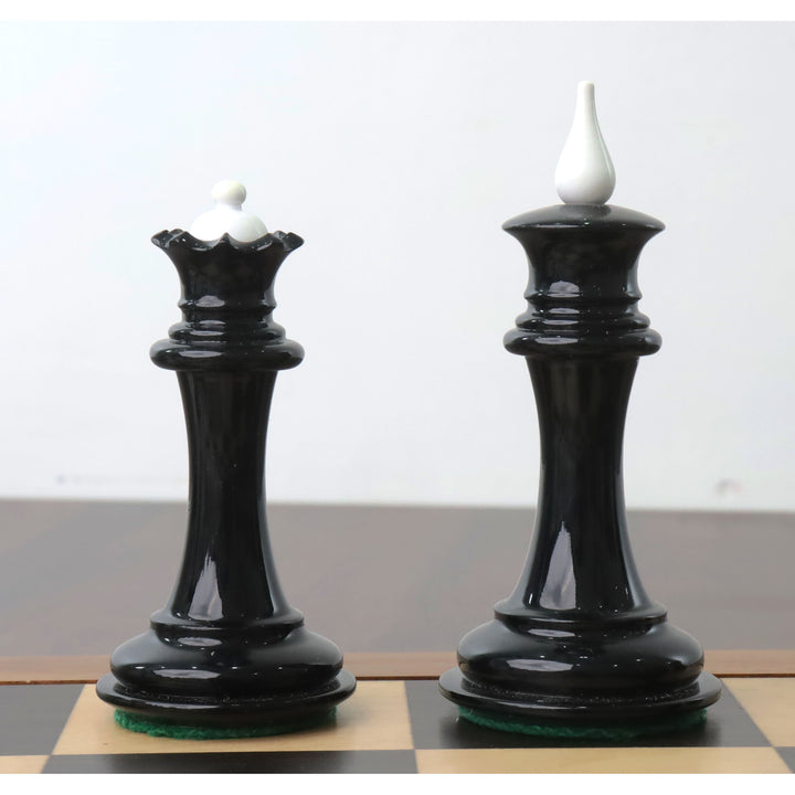 Elegant black lacquer Soviet reproduction king and queen pieces with contrasting white finials.